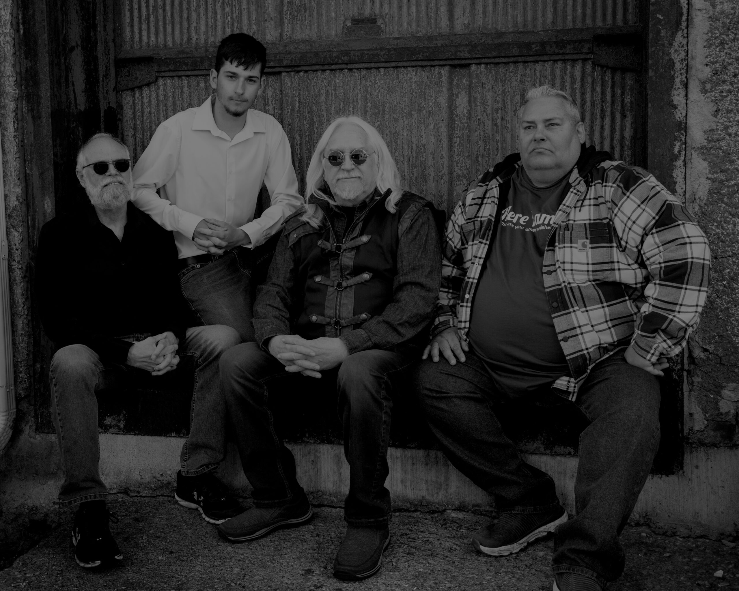 The band under stage lights